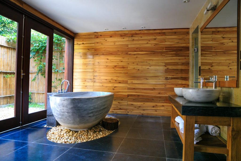 Photo by Quang Nguyen Vinh from Pexels: https://www.pexels.com/photo/round-white-and-gray-ceramic-bathtub-inside-brown-room-2134224/